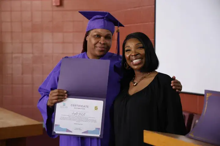 Graduate receiving a certificate