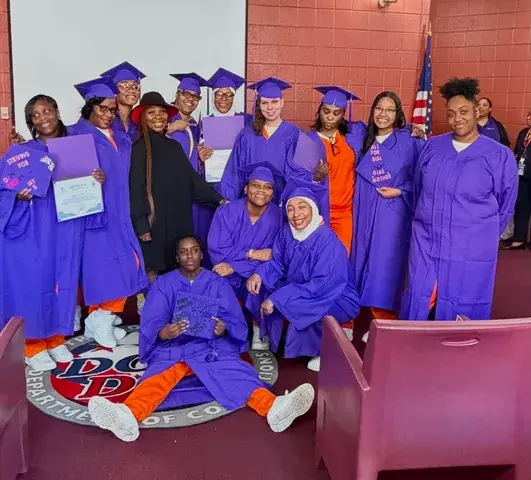 Graduates celebrating their achievements together